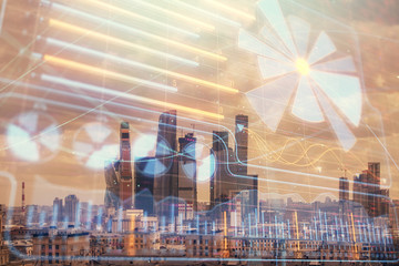 Double exposure of business drawing hologram on cityscape background.