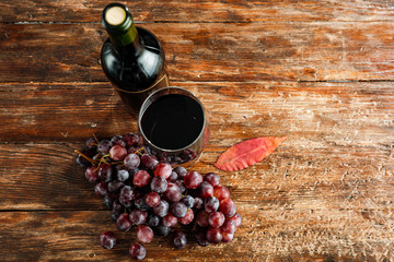 Wine on wooden desk and free space for your decoration 