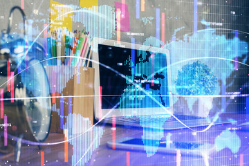 Double exposure of business theme icons and work space with computer background. Concept of success.