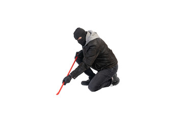 a burglar knee with crowbar and mask against a white background