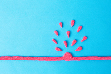 Torn vein on a blue background with blood. The concept of medical diseases. Vein aneurysm, stroke and heart attack, blue background, copy space