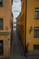 Narrow alleys in the old town Gamla Stan in Stockholm a summer day.