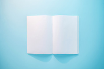 Blank magazine, notebook, brochure, booklet or book with softcover mockup template in the sunlight...