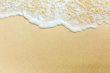 sea foam on sand