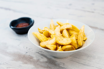 Golden French fries potatoes ready to be eaten