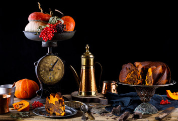 Autumn cupcake with chocolate. Fragrant homemade cakes. Vintage background.