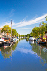 Fototapeta na wymiar View of Edam Netherlands with canal, boats and traditional architecture