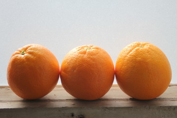 Fresh Oranges by the Window