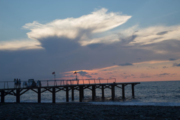 Obraz premium Exotic Paradise, sunset. Tourism and Vacations Concept. Resort. black sea Dock on the beach Batumi