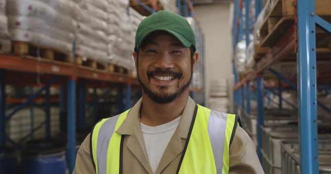 Portrait of young male warehouse worker 4k