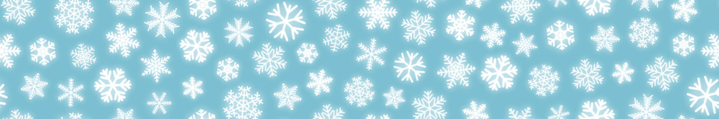 Fototapeta na wymiar Christmas horizontal seamless banner of white snowflakes on light blue background