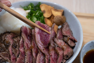 Japanese beef bowl or gyudon in Japanese, beef cook with onion and soy suace.