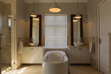 Bathtub in bathroom at home