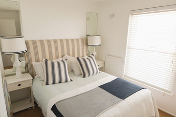 Modern luxury bedroom with blankets and pillows