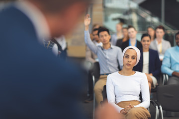 Business people in a business seminar 