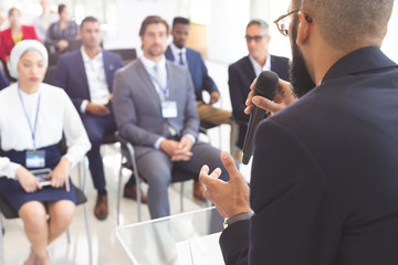 Male speaker speaks in a business seminar