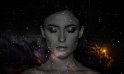 Silhouette of woman on space background.