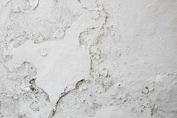 The grunge white concrete old texture wall