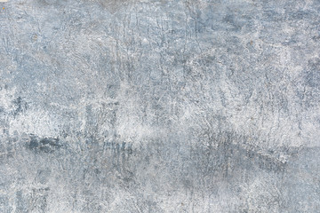 Concrete wall texture for background. Traces of white paint.