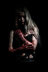 Pale bloody woman