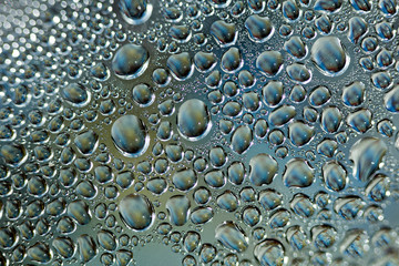 Water drops macro from a plastic bottle fifty megapixels