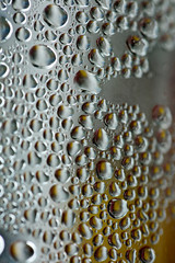 Water drops macro from a plastic bottle fifty megapixels