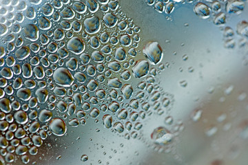 Water drops macro from a plastic bottle fifty megapixels