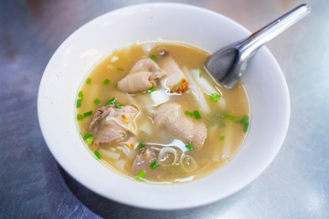 chinese noodle soup with pork offal