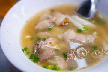 chinese noodle soup with pork offal