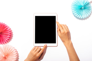 Female's hands using tablet