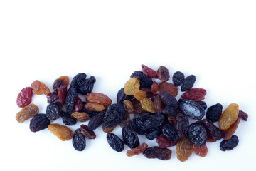 Raisins or Dried grapes mix color black, red, green isolated on white background