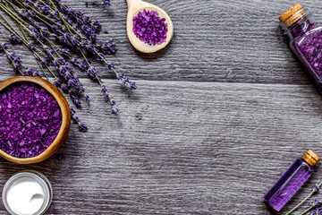 organic cosmetics with lavender on wooden background top view