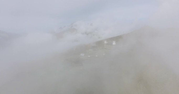 Drone flies through skies towards Astronomy Telescope, Gornergrat Zermatt in Alps Mountains, Switzerland.,4k