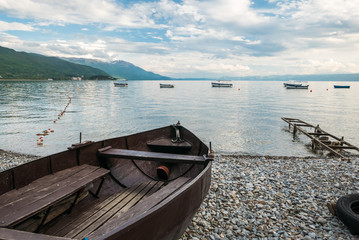 Naklejka na ściany i meble boats on Lake Ohrid in Macedonia with mountains in the background