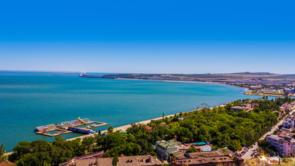 Naklejka na ściany i meble magnificent summer landscape with views of the sea and the Crimean bridge in the city of Kerch from mount Mithridates