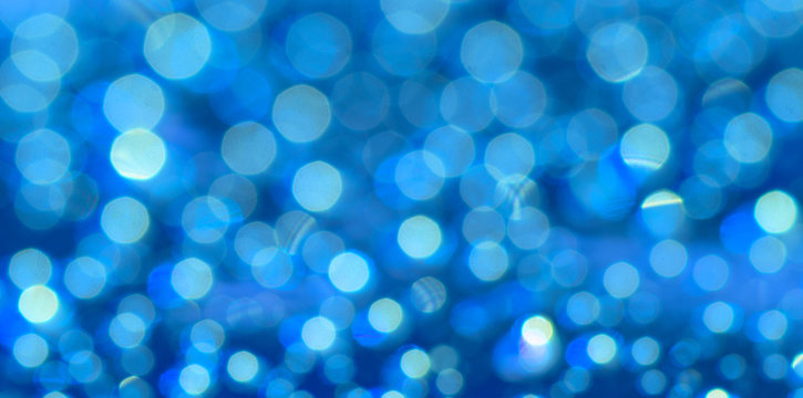 abstract background texture blurred defocused bright light spots bokeh blue color