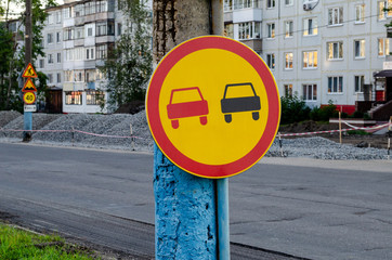 Road sign Overtaking is prohibited. Repair work on the repair of the road. Temporary sign overtaking prohibited.