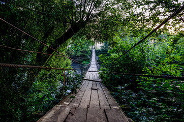Suspension bridge in Khotylevo. Suspension bridge boards close up.