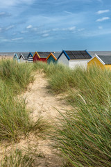 Fototapeta na wymiar Beach huts on Southwold beach in Suffolk England
