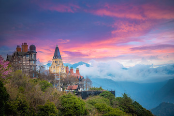 Landscape scenery view of Old England Manor with sunrise sky background, Near Cingjing Farm and Evergreen Grassland, Nantou County, Taiwan,