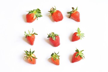 Sweet strawberry on a white background. Summer dessert. Flat lay photography