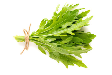 bunch of fresh arugula isolated on white background top view