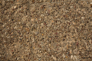 Rough beige concrete surface.
