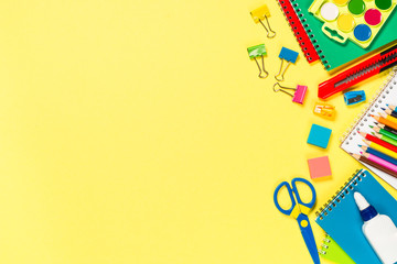 School and office sstationery on yellow background.