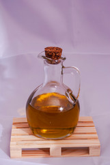Small bottle of oil on a white background