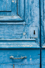 detail of an old blue door