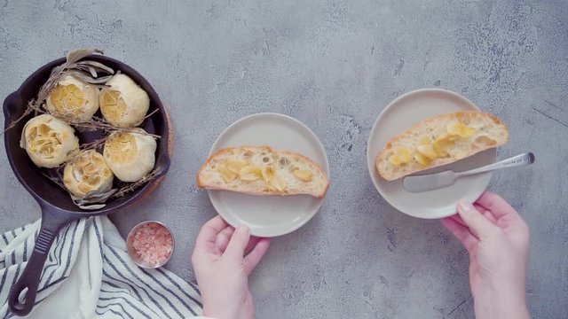 Roasted garlic spread recipe made with spices in cast iron skillet.