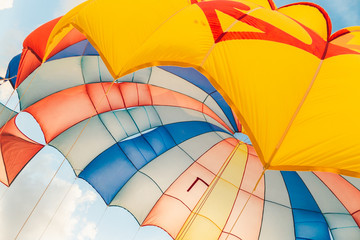 Obraz premium Color parachute kite in the sky