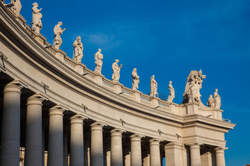 Fototapeta na wymiar Detail of the Bernini Colonnade at Vatican City in a beautiful spring day