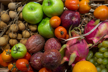 Naklejka na ściany i meble Various kinds of tropical fruits are placed in various ways.